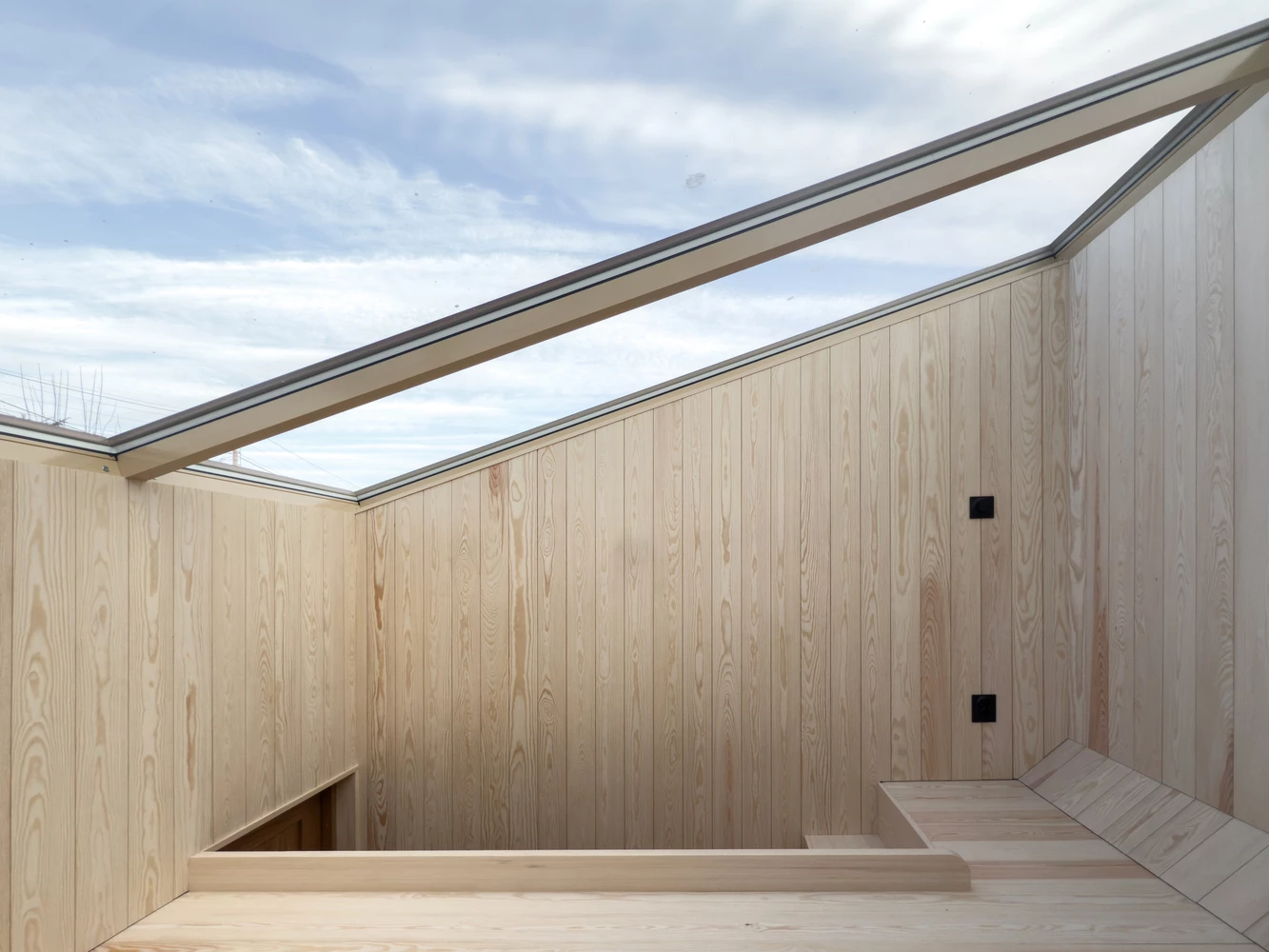 The sauna is a private sanctuary within the folly