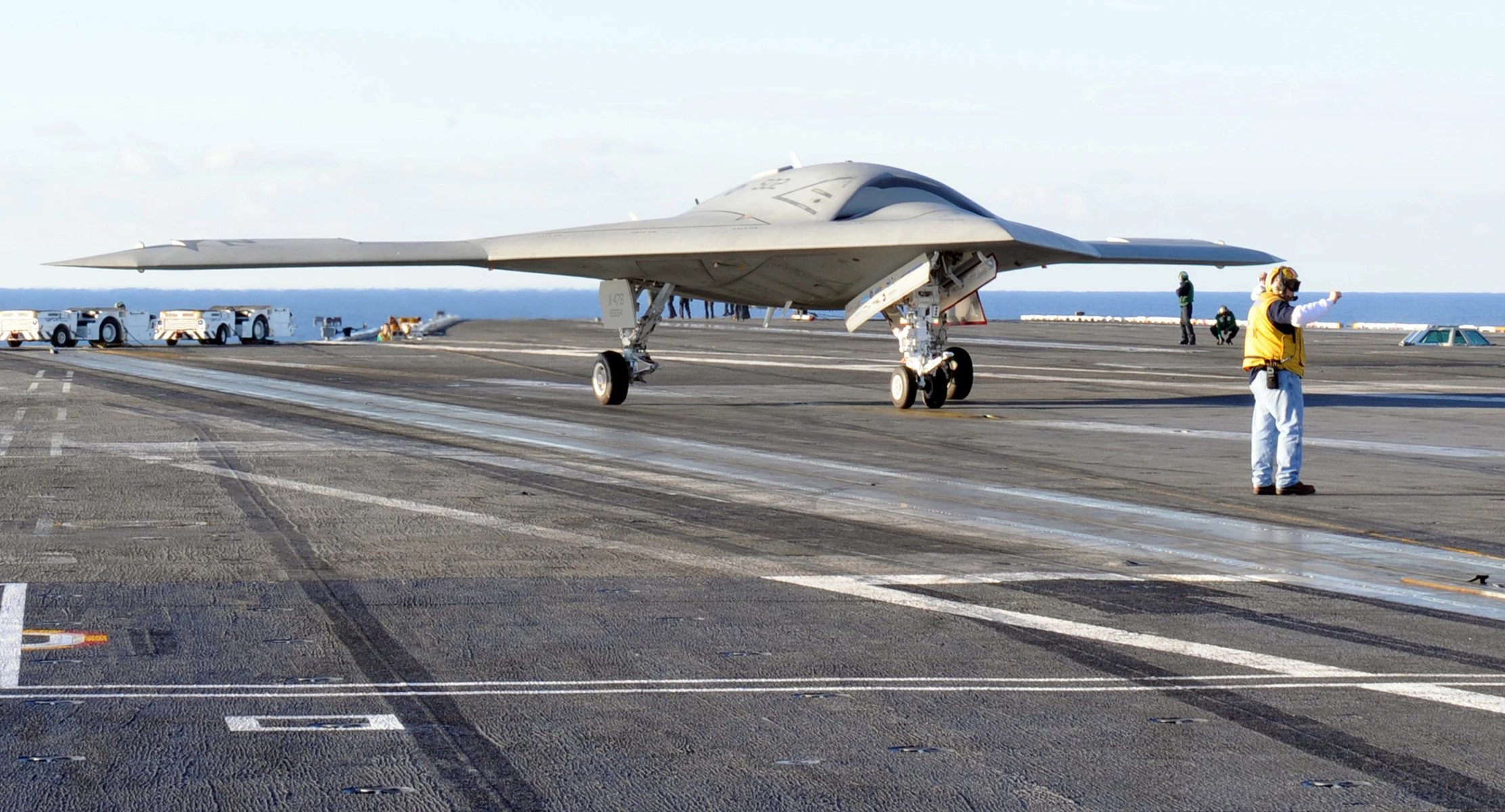 The X-47B unmanned aircraft negotiates the USS Truman's flight deck (Photo: U.S. Navy MC2 David R. Finley Jr)