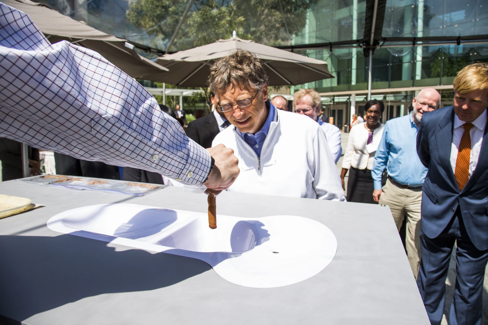 Bill Gates evaluates the Toronto Toilet at the Reinvent the Toilet fair in Seattle