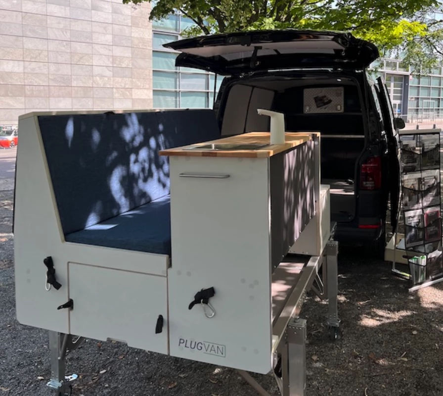 PlugVan debuted its new tiny camper van kit over the summer