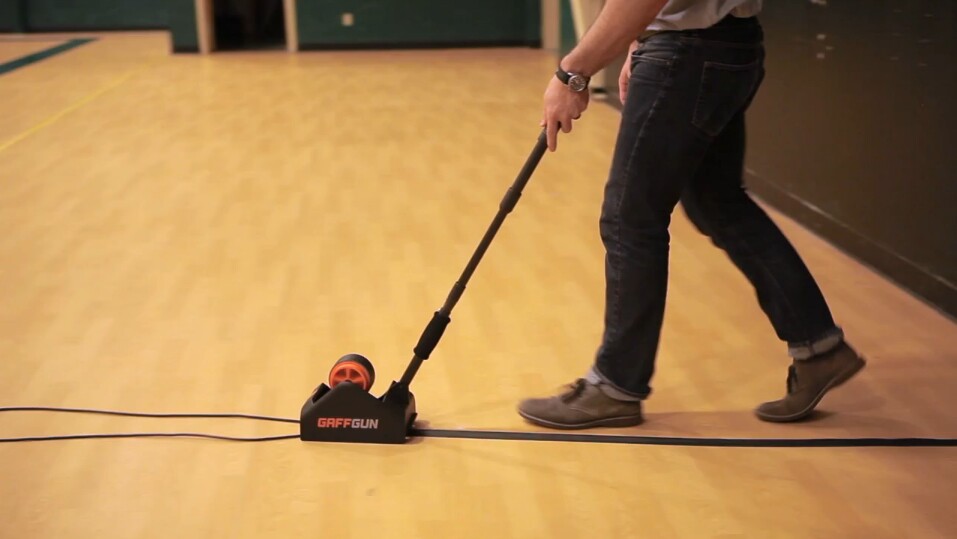 GaffGun tapes down wily cables no squatting required