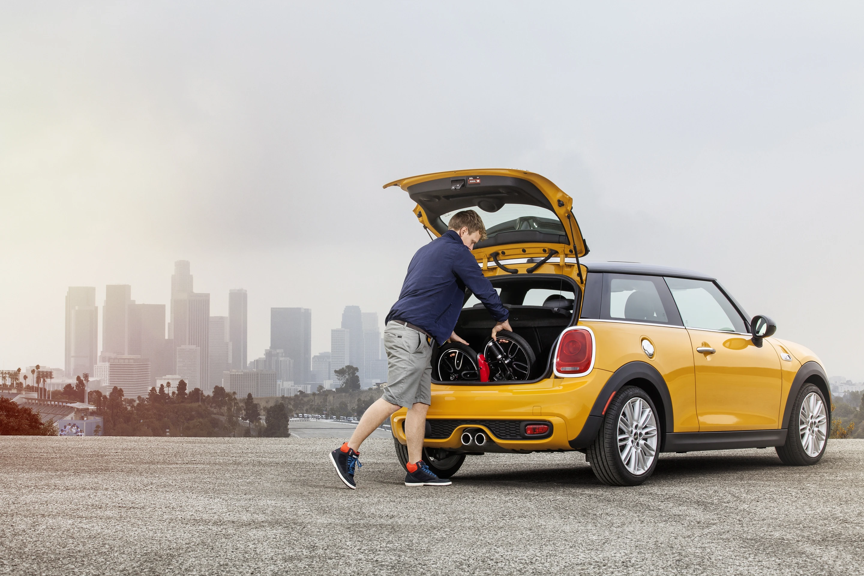 BMW has unveiled its Mini CitySurfer folding electric vehicle concept