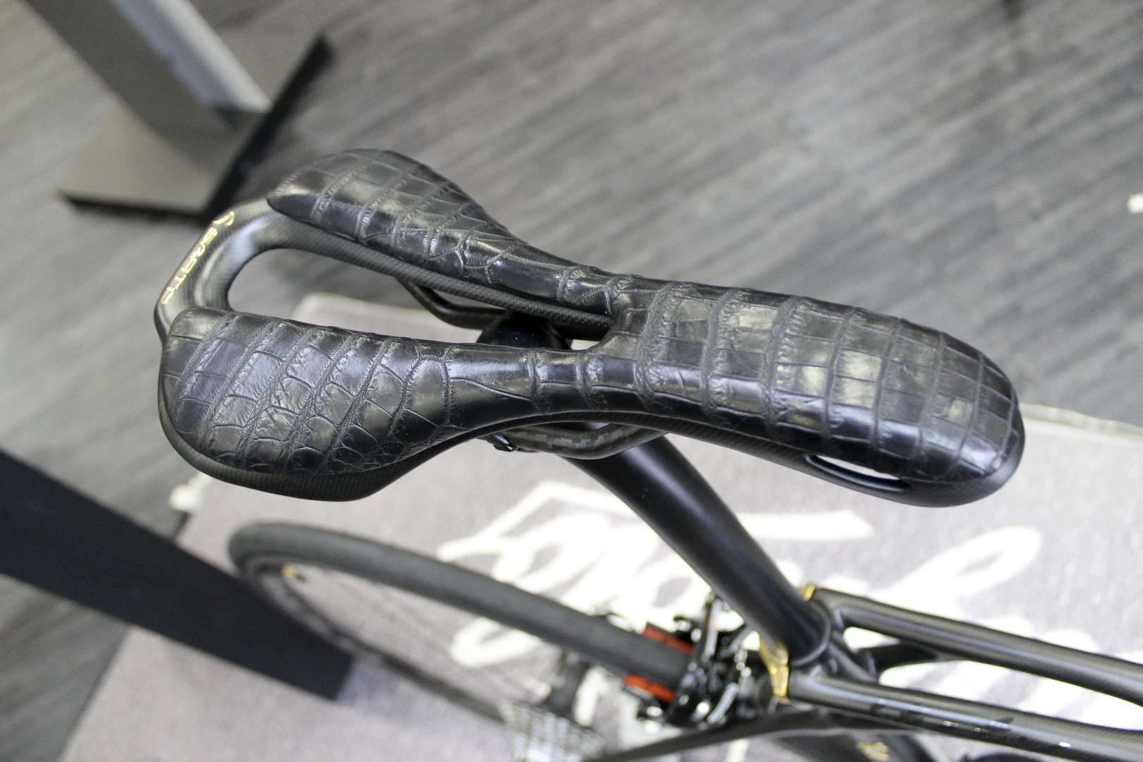 The Sarto 18K features a Zimbabwean crocodile skin seat and handlebar grips