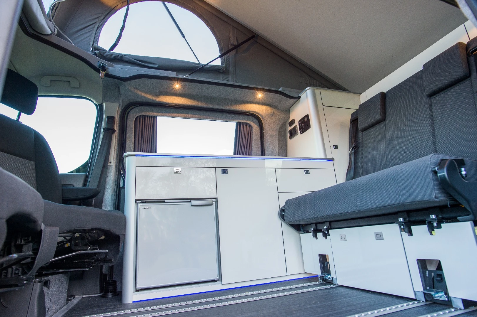 The Lerina's front driver and passenger seats swing around at camp