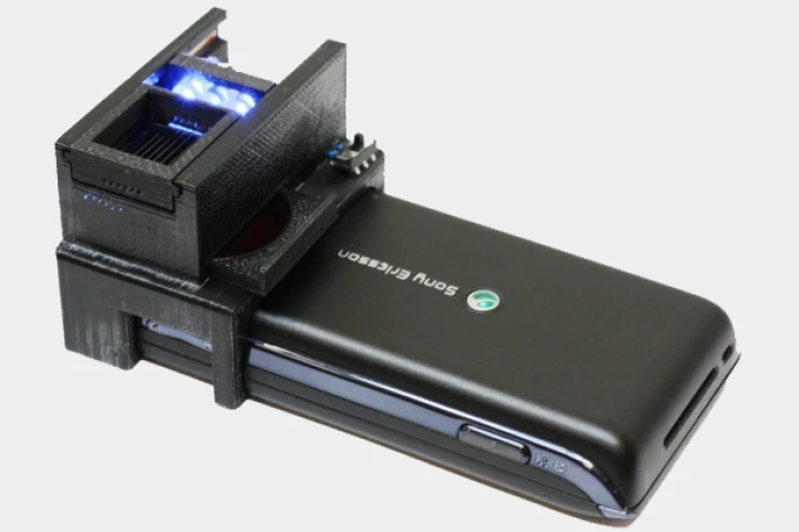 Scientists have created a scanner that can be attached to a mobile phone, to detect the presence of E. coli bacteria in liquid samples