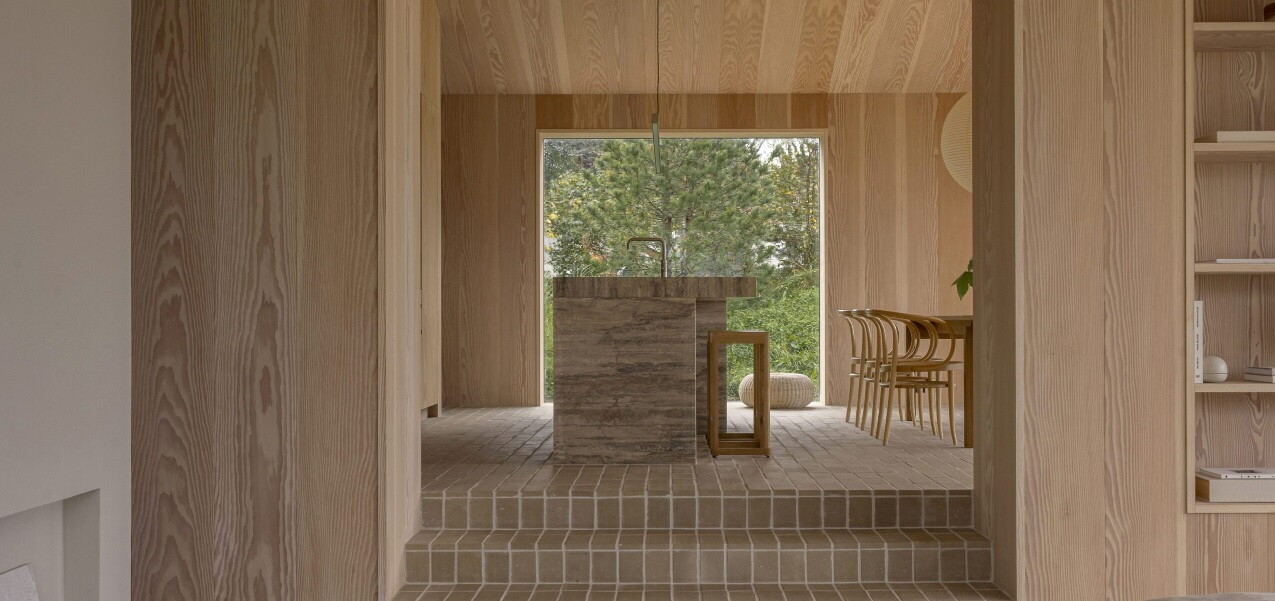 The Heatherhill Beach House by Norm Architects seamlessly integrates with its scenic surroundings