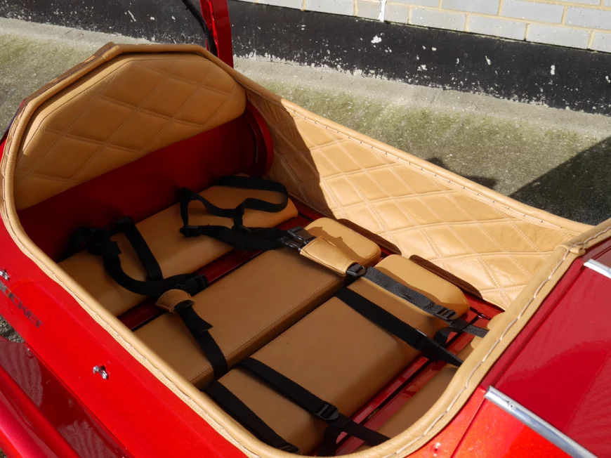 The seats fold flat to create a mattress for when the trike is parked