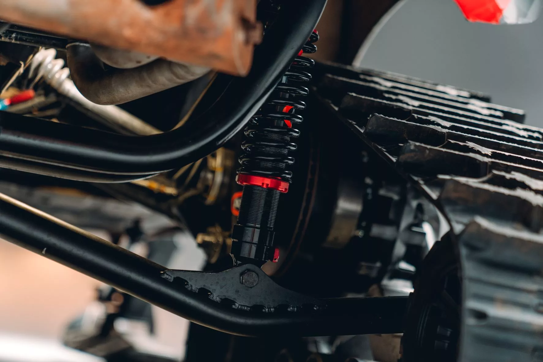 Rear track suspension