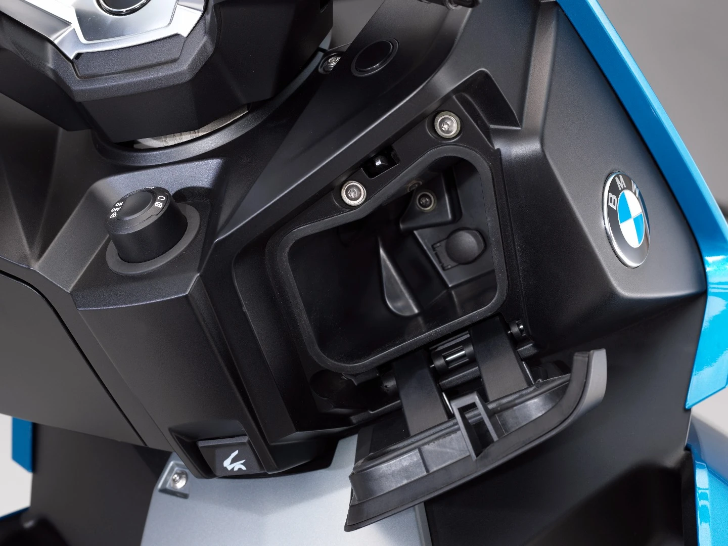 The C400X has plenty of under-seat storage as well as small storage compartments at the front of the bike