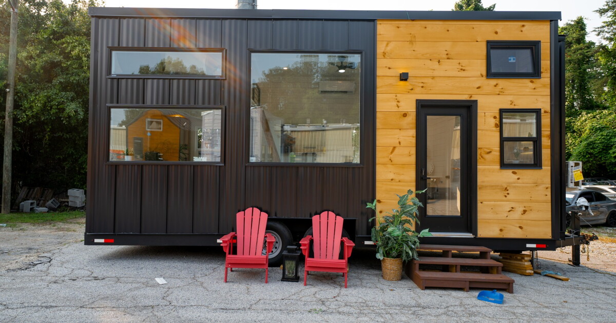 Affordable tiny house packs a bedroom downstairs and two more up top
