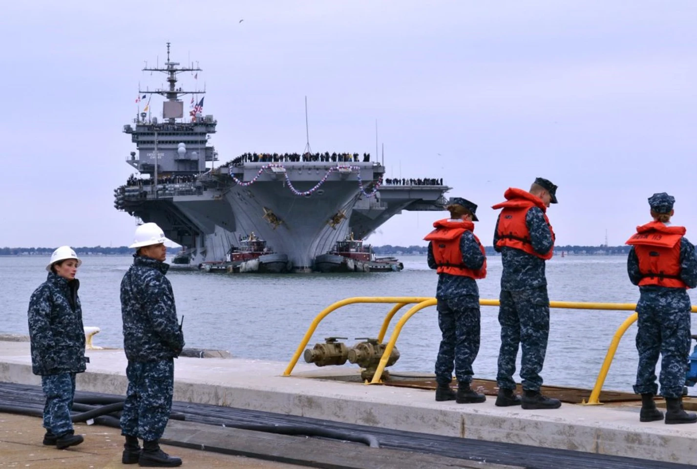 USS Enterprise being towed for deactivation