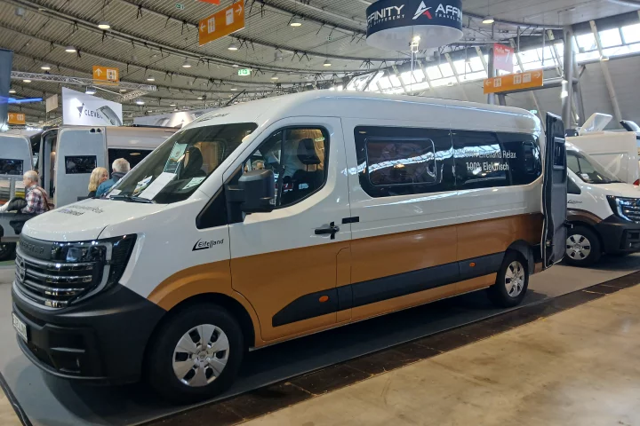 This white and brown mustard Nissan Interstar-e may not look it from outside but is a warm, woodsy lodge ready to explore the world