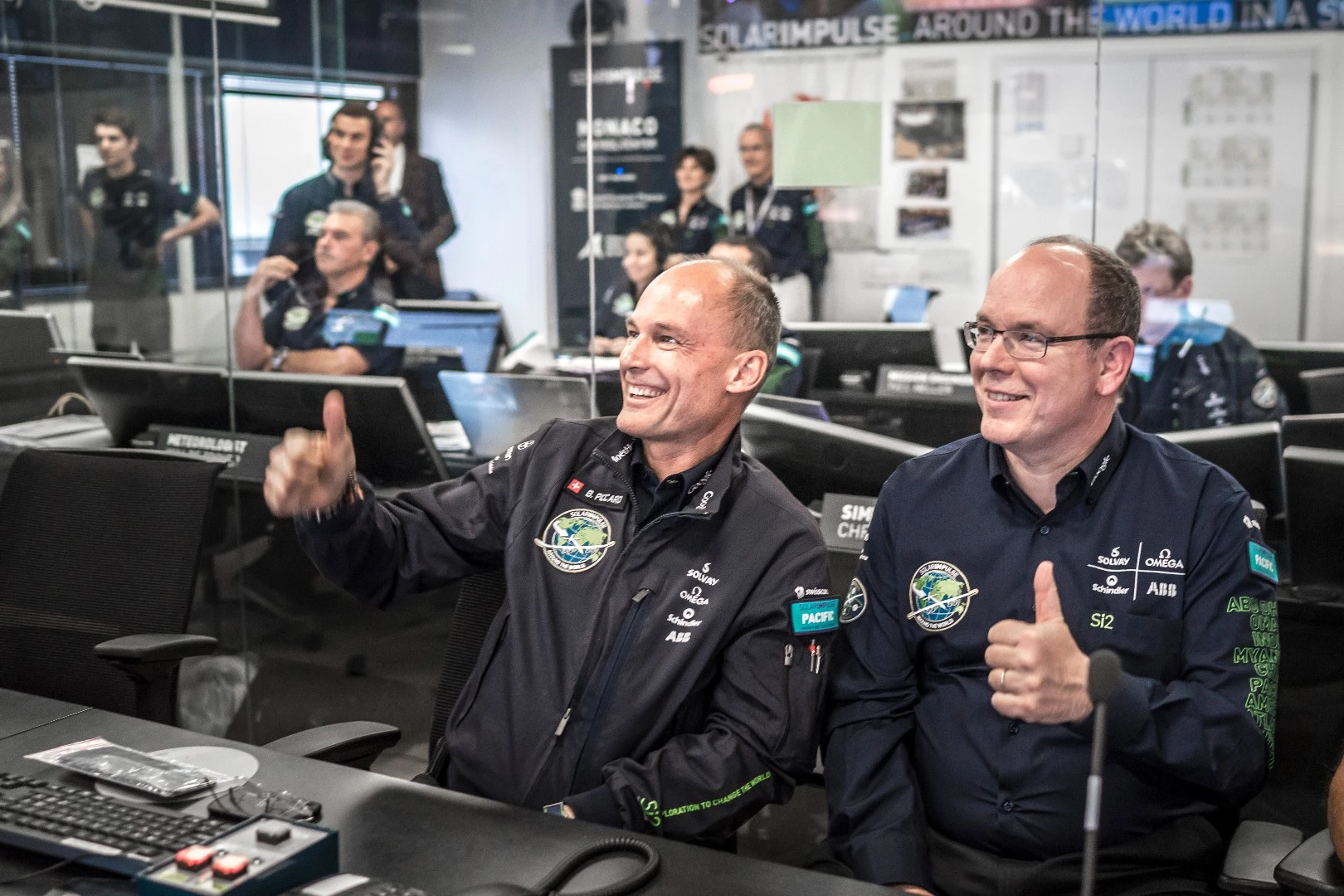 Bertrand Piccard and Prince Albert II of Monaco giving the final go to André for take-off at the Monaco Mission Control Center