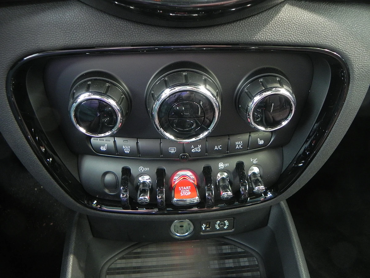The Mini's signature aircraft-style toggle switches are found throughout the cabin