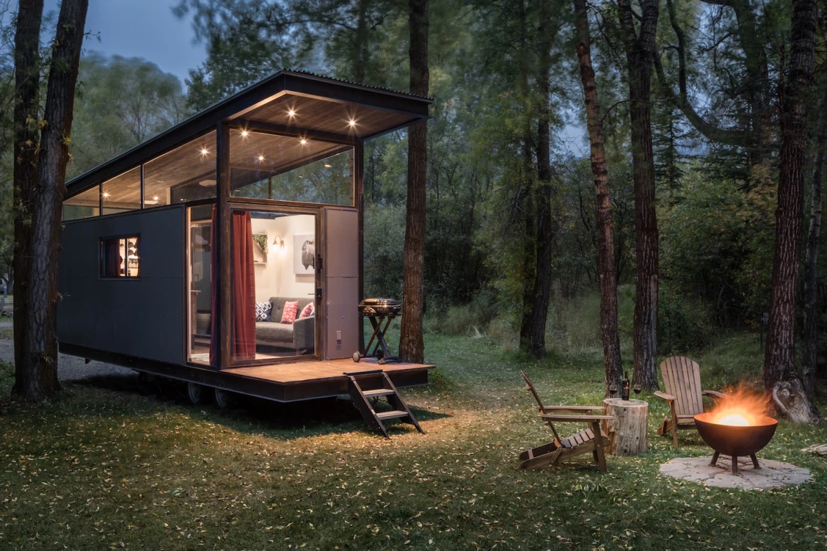 The RoadHaus comprises a steel frame and its exterior is finished in painted cement board siding with black metal trim