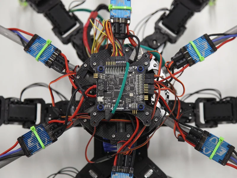 The hexapod hexacopter hybrid uses a Hoverfly Pro flight controller
