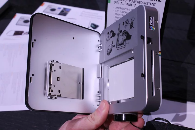 Refilling with zero ink "Zink" paper is simple