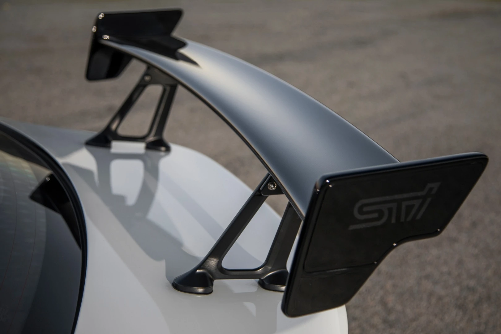 The aero wing's braces are designed to allow fine-tuning to the spoiler for various performance tweaks