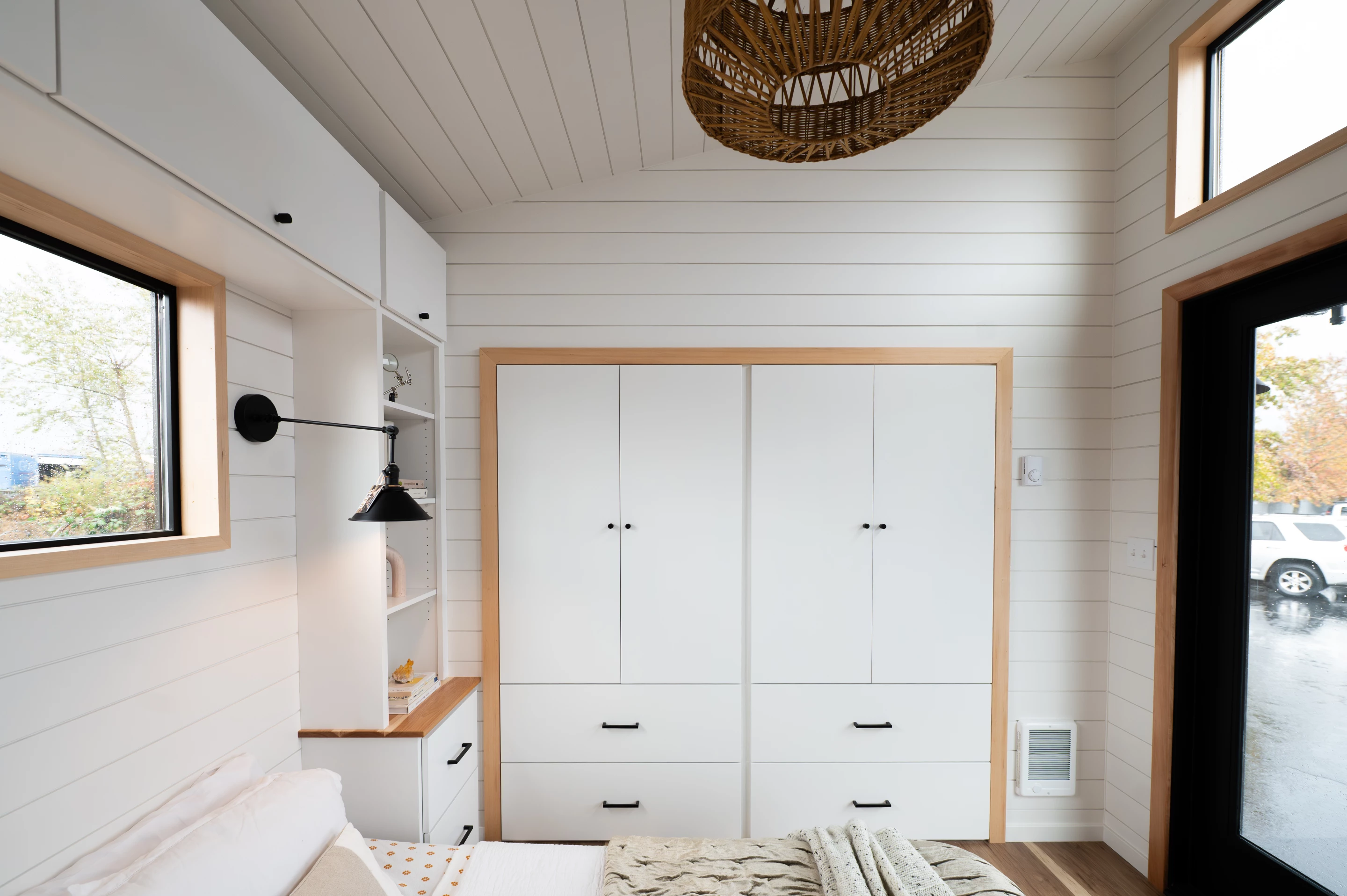 The Urban Park Max 37's bedroom has generous glazing, including its own glass doors that open up to the outside