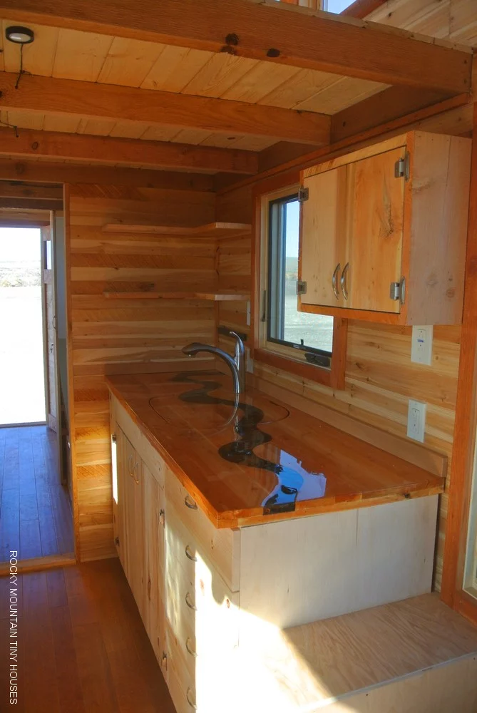 The home comprises an impressive 20.25 sq m (218 sq ft) of main living space and 6.5 sq m (70 sq ft) of sleeping loft space (Photo: Rocky Mountain Tiny Houses)