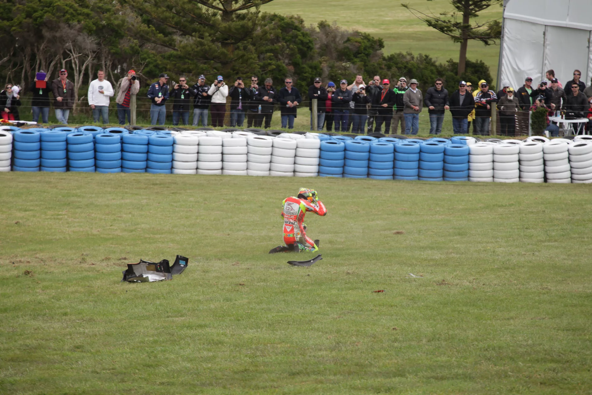 Rossi sends his motorcycle down the road during warm up practice