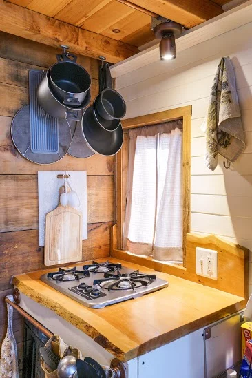 Smart use of overhead space in a tiny home is a must