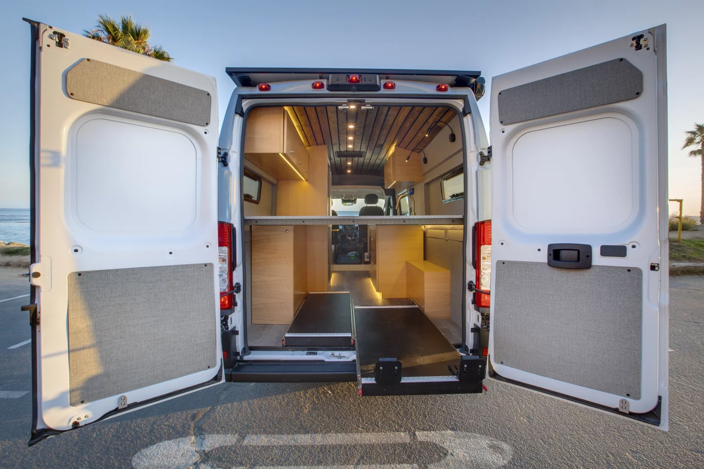 By eliminating the previous rear bathroom, Rossmönster frees up a more permanent bed and plenty of flexible cargo space