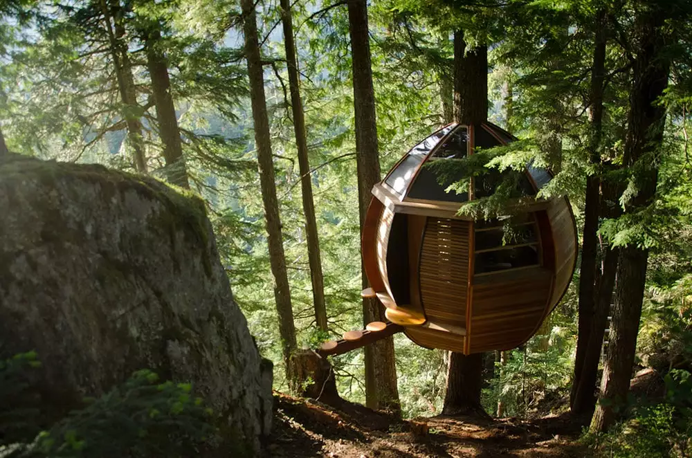 Unlike many buildings described as such, the HemLoft in British Columbia, Canada is a treehouse in the truest sense: the entire weight of the egg-shaped structure is supported by the tree around which it is built