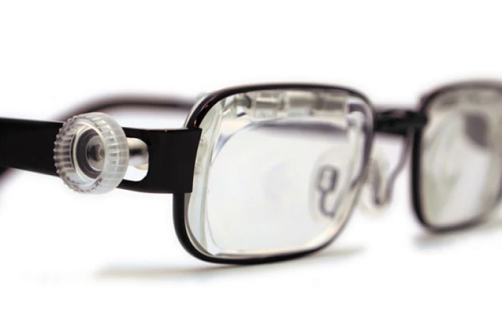 The Eyejusters adjustable glasses with the adjustment tool in place