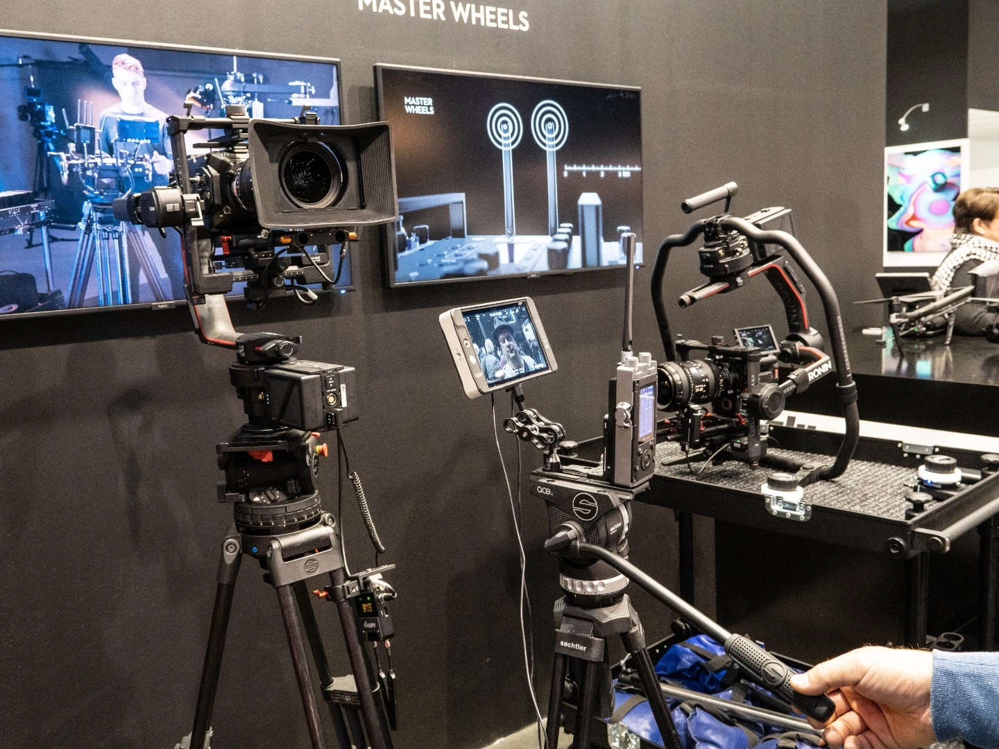DJI's Master Wheels allow smooth, instant remote control of entire large gimbals just by moving a tripod head