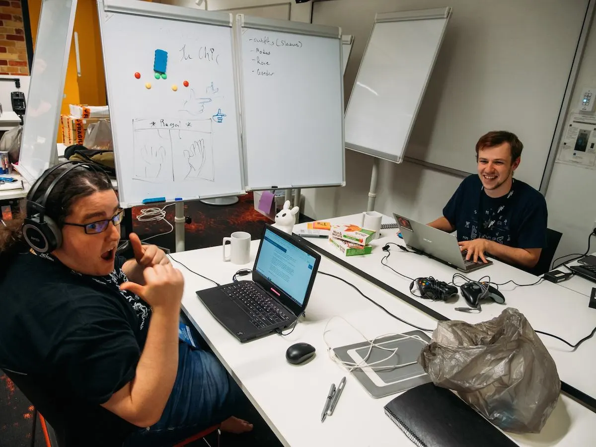 Nicholas McDonnell (left) and Daniel Draper (right) interpreted the Waves theme as the hand gesture, and made a game about competitive hand modeling called Le Chic