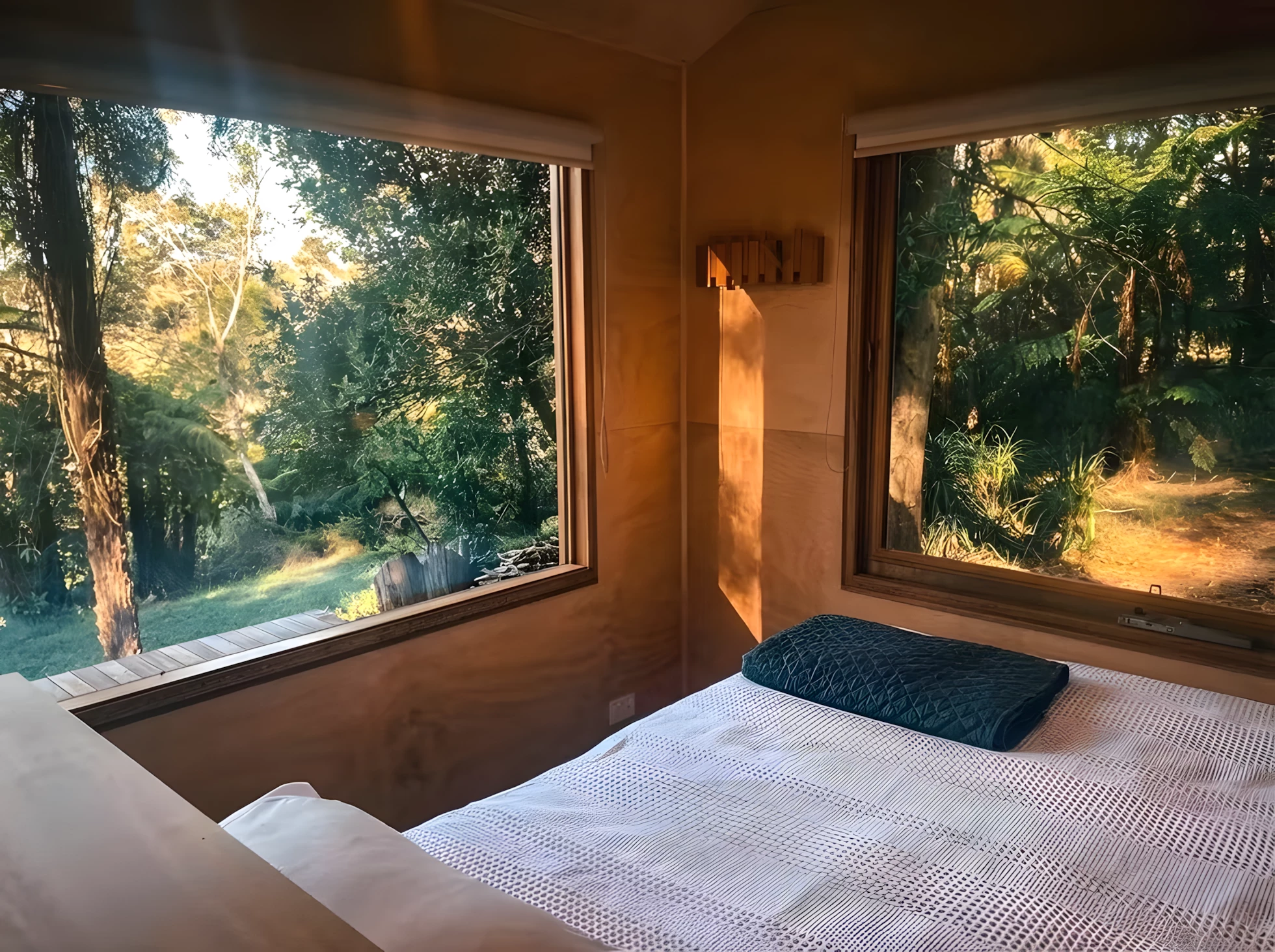 The Zinc Studio Cabin's bedroom includes a double bed and has ample headroom to stand upright