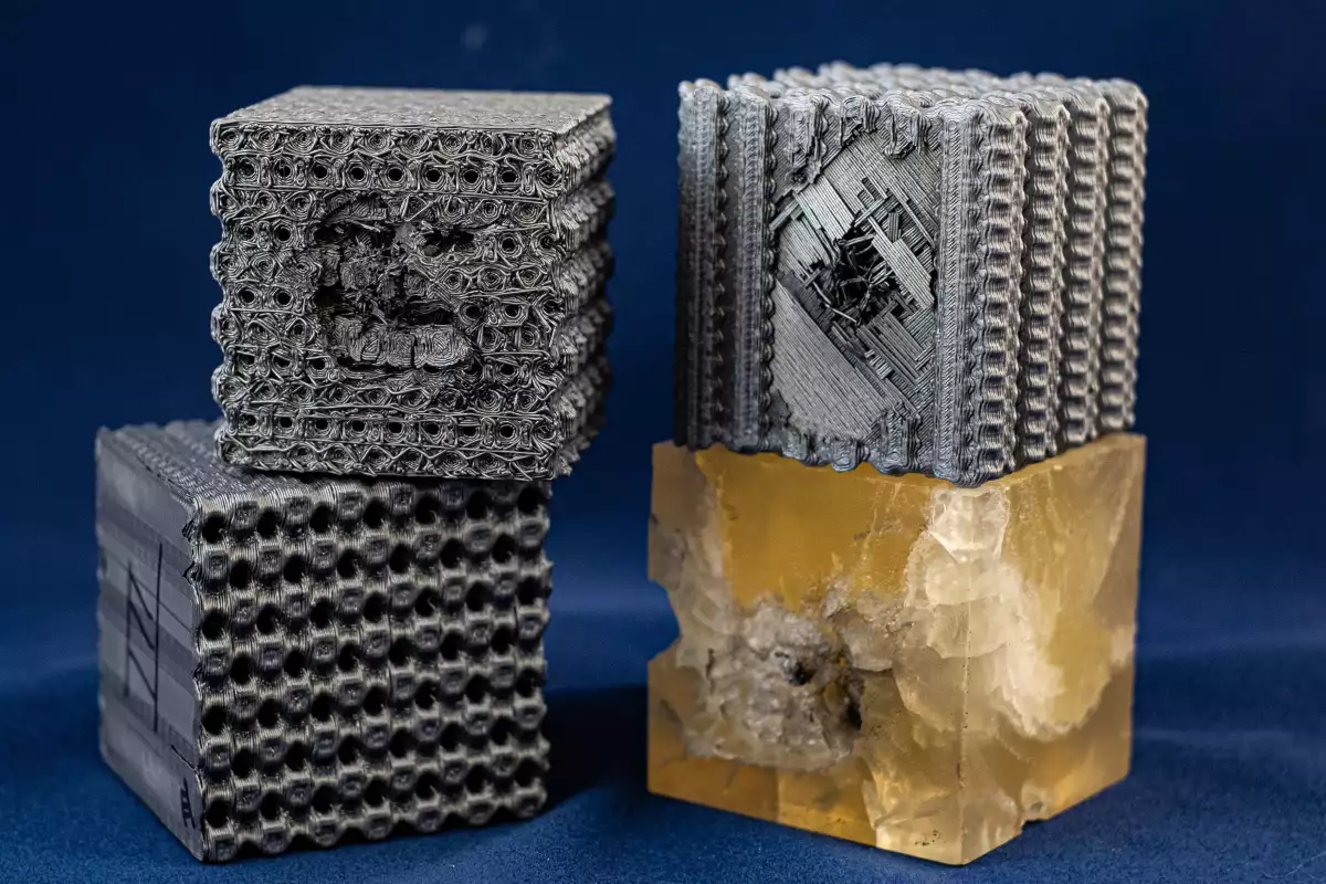 Rice University engineers blasted their lattice structures with bullets traveling at 5.8 km (3.6 mi) per second, with the cubes proving 10 times more effective at absorbing the impact than solid cubes made from the same polymer material
