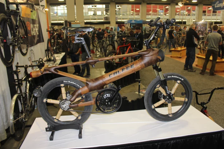 The Calfee bamboo e-bike features a spring-like element in the top of its frame