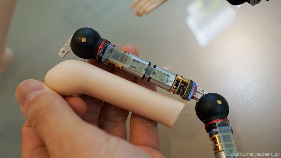 Micro servos are stripped of their plastic casings right down to the gears in order to fit inside the Smart Doll's vinyl body