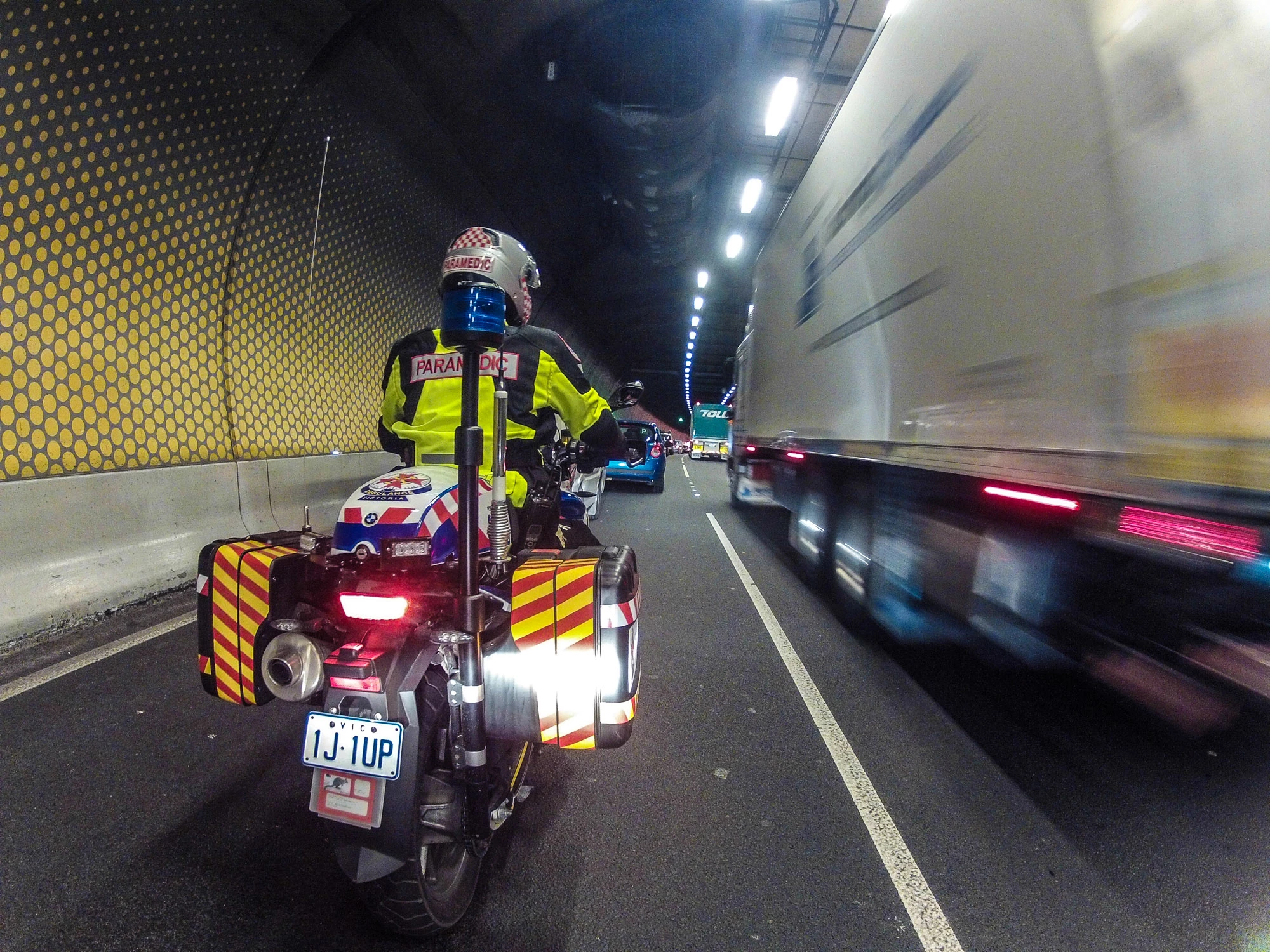 "Now we're in the tunnel. We avoid lane filtering or lane splitting when we haven't got lights and sirens on. A lot of motorcyclists like to ride quite aggressively in traffic for visibility, but our training is the opposite. It's a safety thing, but also a reputation thing. We've got 'ambulance' plastered all over the bike so we have to make sure we obey the road rules and be very courteous in traffic."