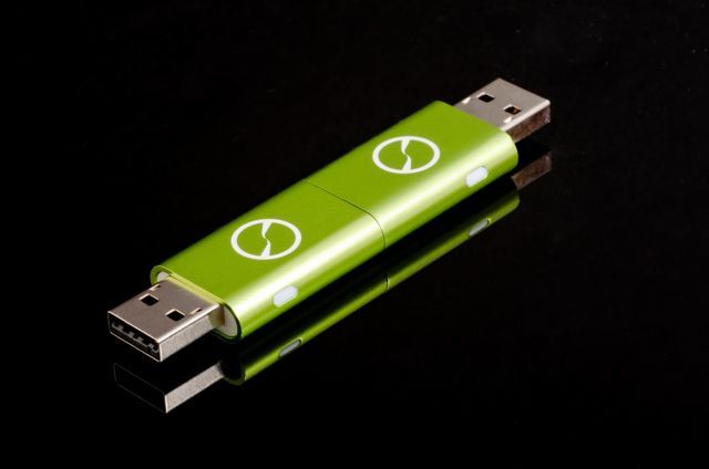 Using two flash drive-like USB sticks, iTwin allows two remote computers to access one another's complete hard drives via a secure internet connection