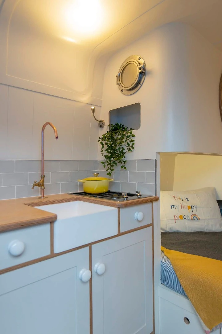 Keeping the color schemes fresh, the camper is filled with light and space