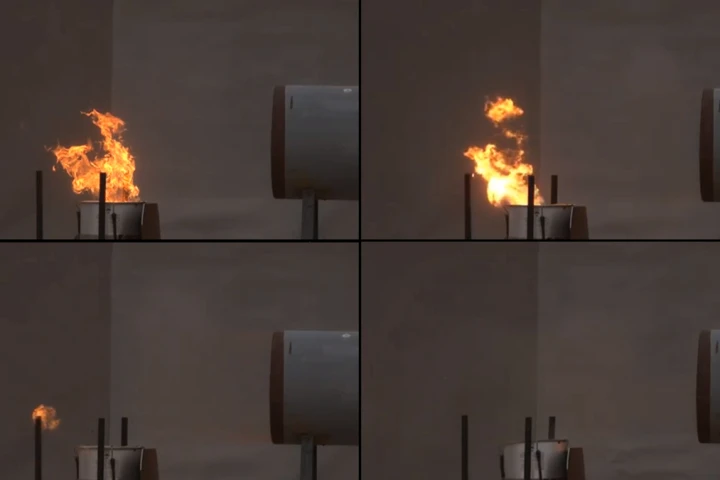 A flame is blown off its fuel source with a blast of air from explosives