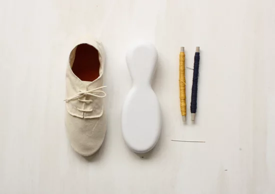 The Repair It Yourself shoe and darning kit