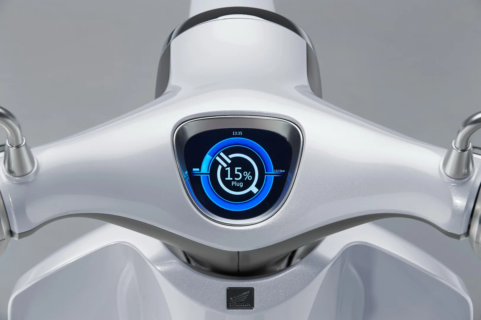 The digital instrument of the Honda EV-Cub during charging