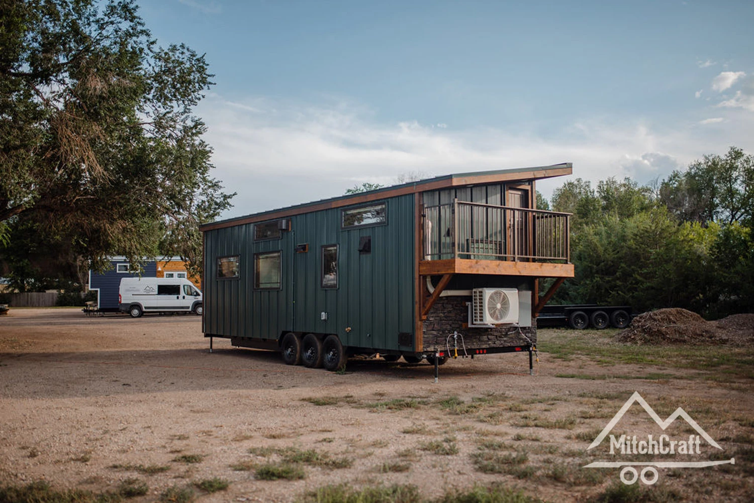 Lisa's 30 x 10 Tiny Home features a small balcony area that will be primarily used by the owner's visiting grandchildren