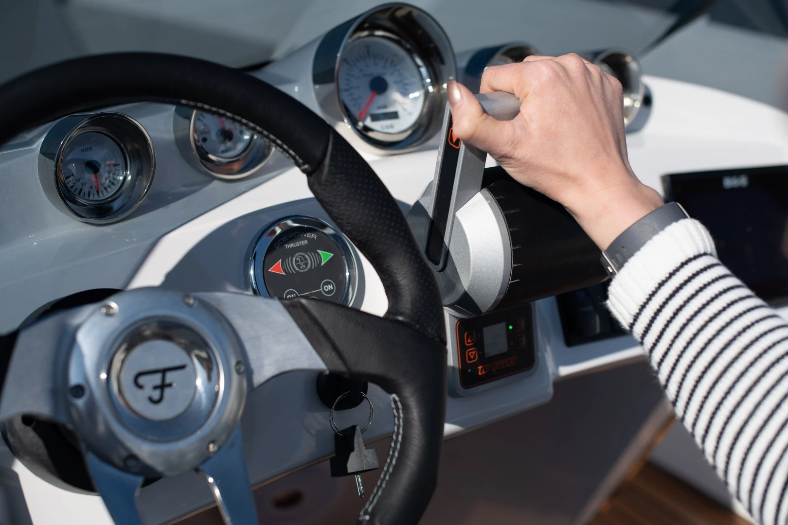 The 740 Mirage has a bow thruster (controls under thumb) for fool proof docking