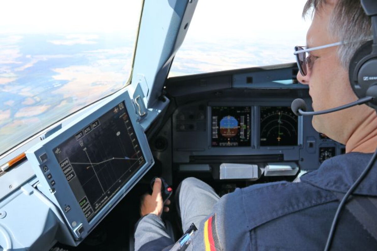 A pilot consults the LNAS display before beginning a landing approach