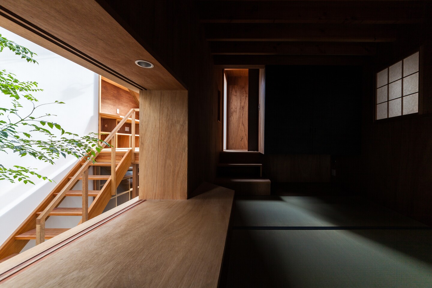 The architect carefully narrowed down the light as the resident moves through the House in Ouji to create a gradually shifting relationship between its interior spaces