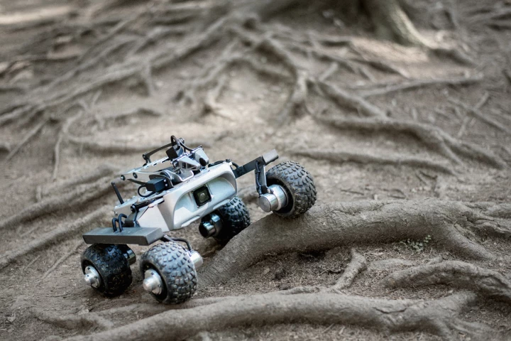 The Turtle Rover uses its NASA-inspired suspension to take on some roots