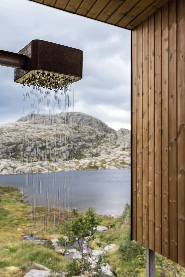 The wash room is located directly above a mountain river