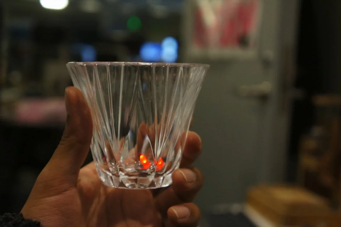 With one cube of each color (green, yellow, and red) in a glass, it will seem as if the lights are changing from green to red depending on how much alcohol a person imbibes