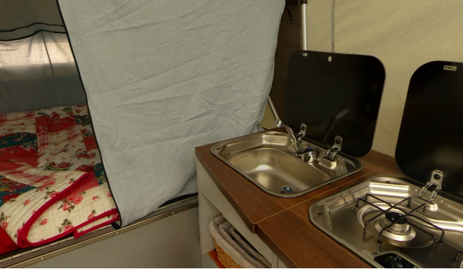 The kitchen module in the Opus Camper