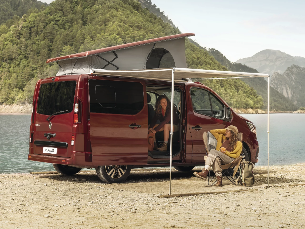 No pre-delivered deck or outhouse here, the SpaceNomad features a classic mid-size camper van layout with fold-down lower bed, pop-up sleeper roof and available side awning